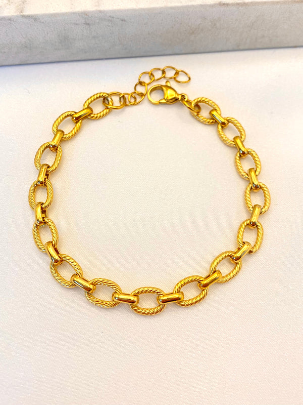 Pulsera Eslabon Oval Grabado Dorado Acero